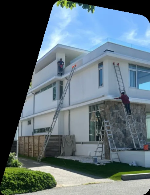 Costa Painting LLC crew painting the exterior of a home in Waterbury, Connecticut